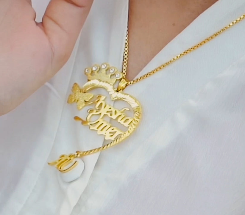 Gold necklace with a heart-shaped pendant on a white background, featuring the text 'mibbilux.com'.
